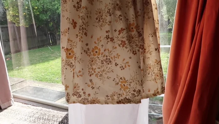 Try on the apron to check the fit and adjust gathers as needed.