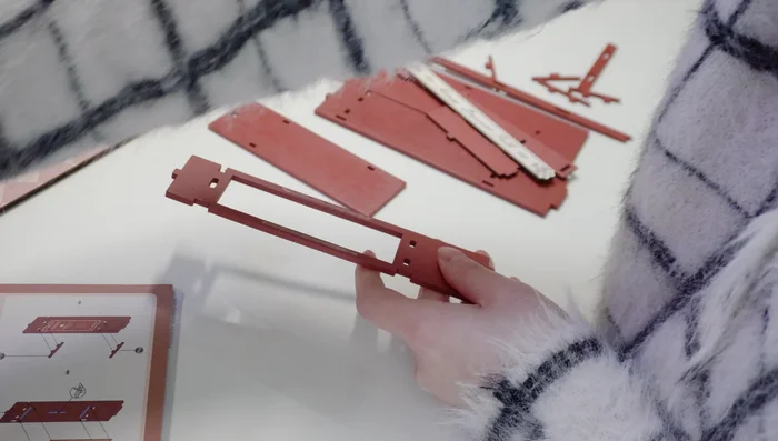 Apply plastic sheets to simulate glass windows and panels.