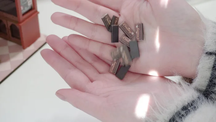 Create custom miniature food items (donuts, candies, cakes, cookies) using polymer clay, acrylic paint, and other materials.