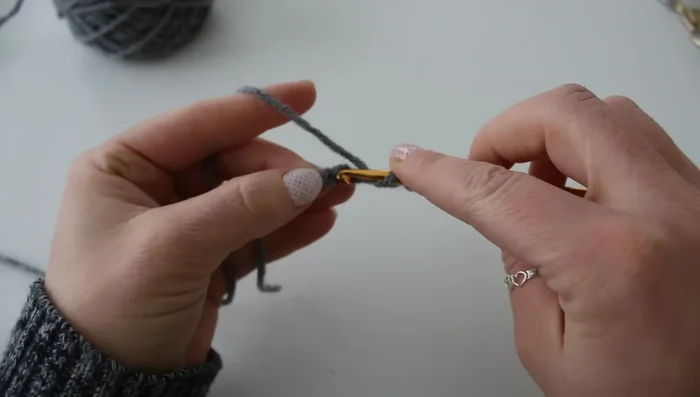 Slip stitch to the top of the first chain to finish the round.