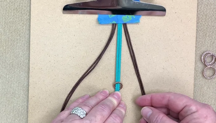 Repeat steps 2 and 3 with progressively larger rings, ensuring a tight, flat braid each time.