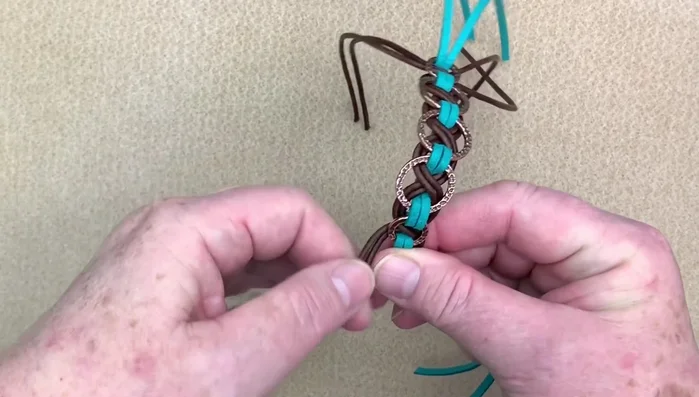 Create a three-strand braid with the loose ends.