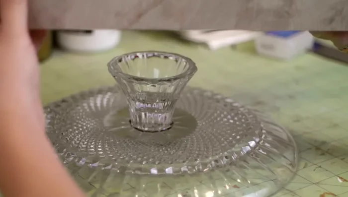 Place a heavy object (book or wood block) on top to press and secure. Let it cure overnight.