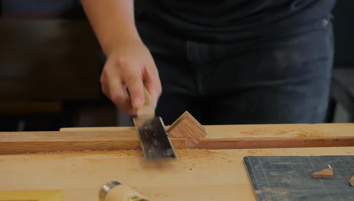 Trim splines flush with a flush trimming saw and sand.