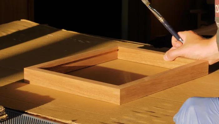 Apply finishes (paint, stain, or clear coat).