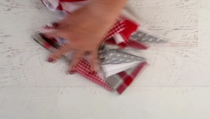 Trim the top edges of the triangles straight.