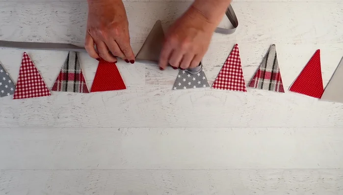 Sew the triangles to the bias binding.