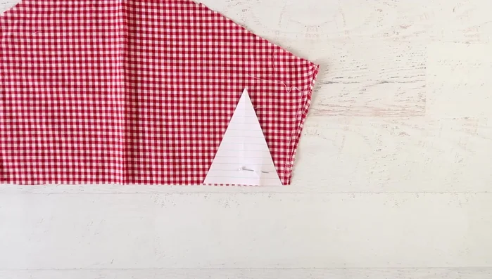Pin and cut fabric triangles using the template.