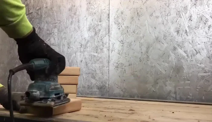 Sand down the blocks using 100 grit sandpaper.