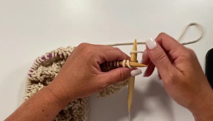 Row 19: Knit two together, knit one, yarn over, knit one, twice, yarn over, knit one, slip, slip, knit, repeat across, knit one.