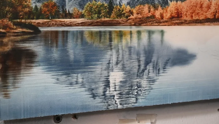 Add more ripples using the eraser. Ensure the reflections mimic the landscape above, adjusting values and hues for a natural look.