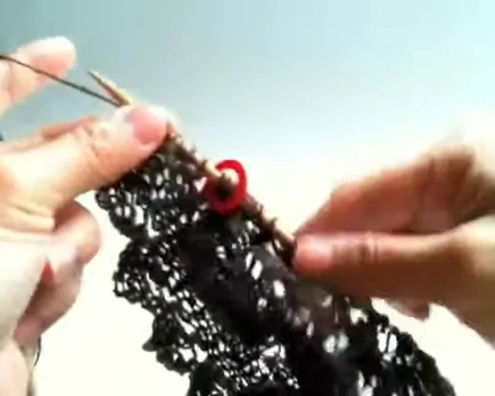 Knit three, purl one (to make a big eyelet), knit three.