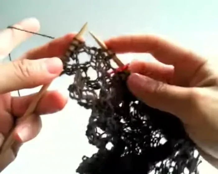 Yarn over twice, slide, slide, knit, knit.