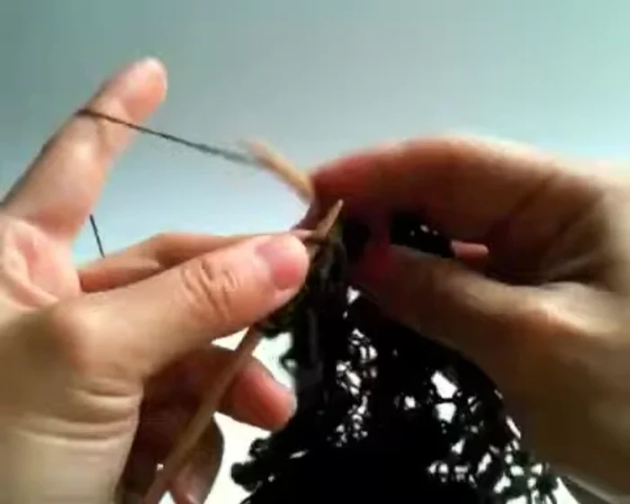 Yarn over twice, slide, slide, knit, knit.