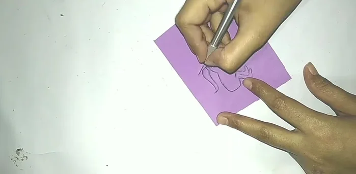 Cut out the design: Carefully cut out your design using a cutter.