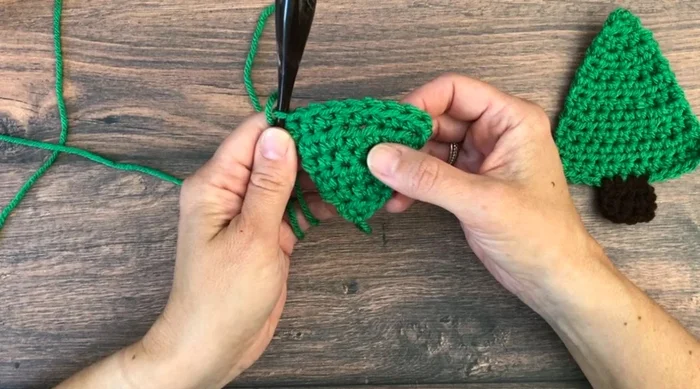 Repeat Rows 5 and 6 four more times to reach 12 stitches. (This builds the tree shape)