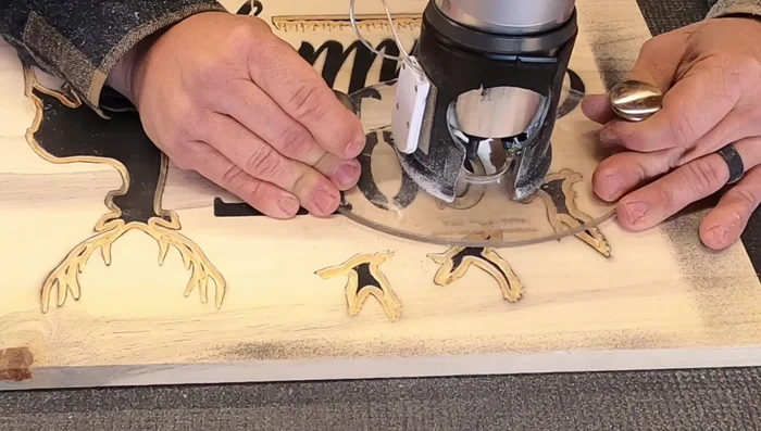 Use a 90° bit (3/16 inch) to remove remaining wood in images and details.