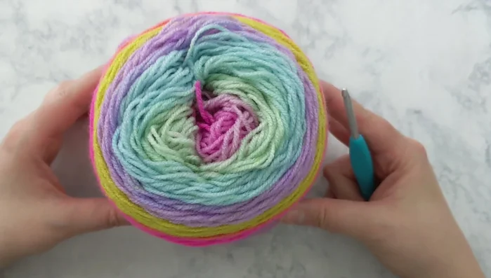 Prepare your yarn: Separate and roll each color into a ball for organization.