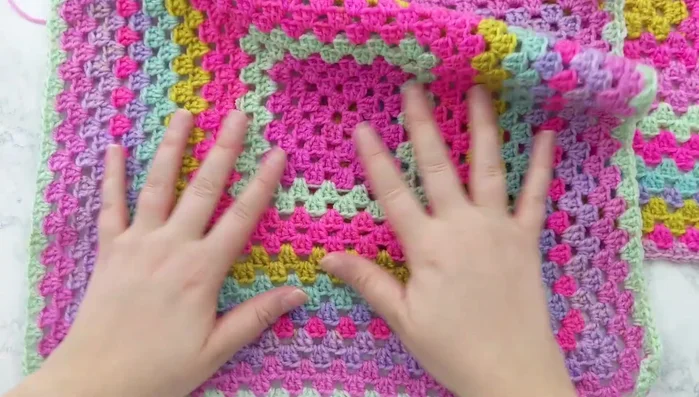 Create a second granny square: Repeat steps 2-4 to create a second granny square of the same size.
