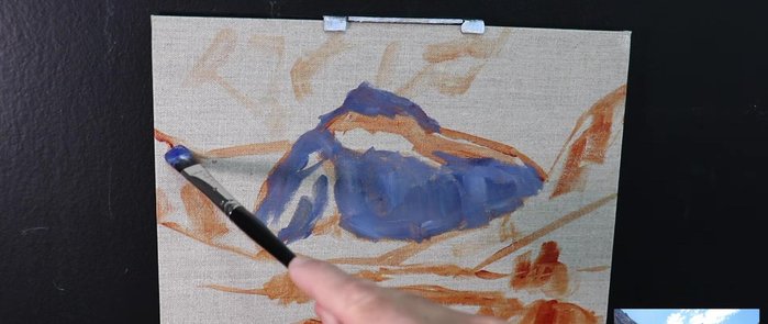 Painting the clouds using a light mix of titanium white, burnt sienna, and a little of the mountain shadow mix