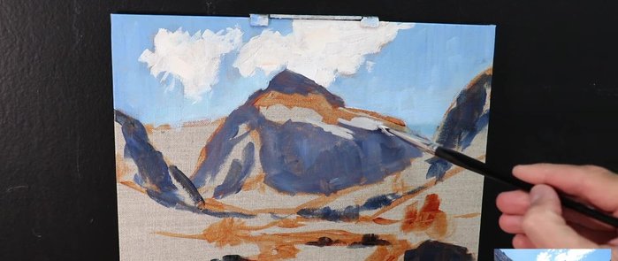 Painting the clouds using a light mix of titanium white, burnt sienna, and a little of the mountain shadow mix