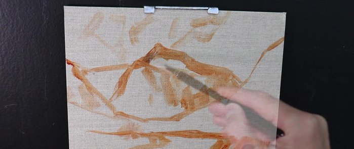 Painting the clouds using a light mix of titanium white, burnt sienna, and a little of the mountain shadow mix