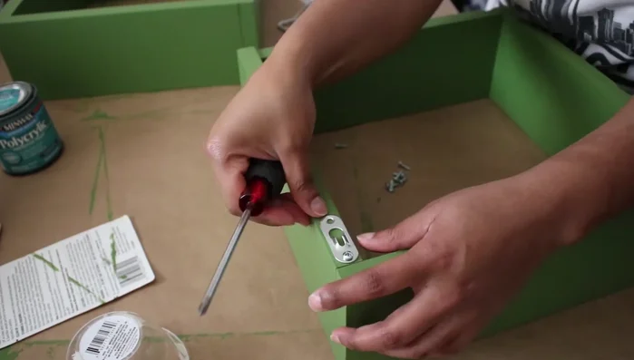 Install keyhole hangers: Attach keyhole hangers to the back of each shelf for easy hanging.