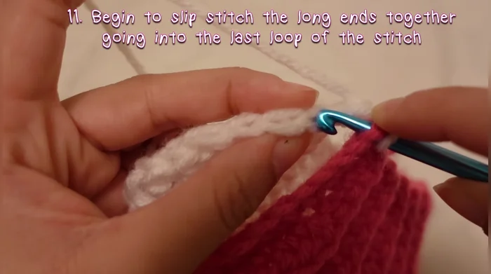 Weave in and out to close the hole at the top of the hat, pulling the yarn tight but not too tight to avoid ripping.