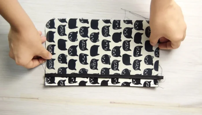 Attach clear pocket to pocket #3: Stitch in the middle.