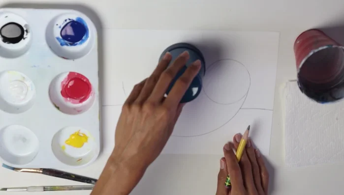 Draw a line across to represent the top of the bowl, overlapping with fruits. Erase any lines under the bowl line.