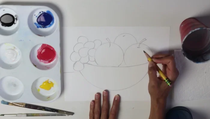 Add details like leaves and stems to your fruits.