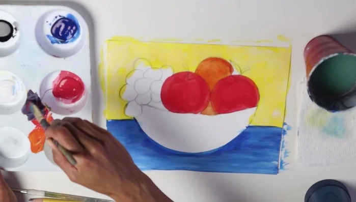 Mix yellow and blue to create green and paint the leaves.