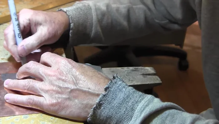 Lightly sand the copper surface using a 3M medium sanding sponge.