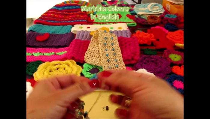 Prepare the yarn: Apply clear nail polish to the yarn end to help thread beads easily. Let it dry.