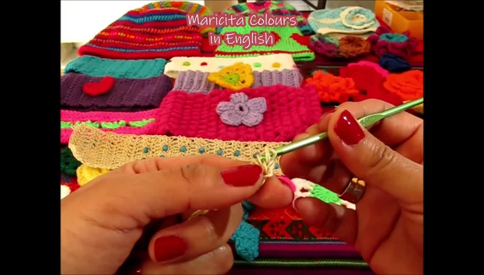 Rows 2-7: Continue double crocheting in each stitch. Work 8 rows before adding beads.