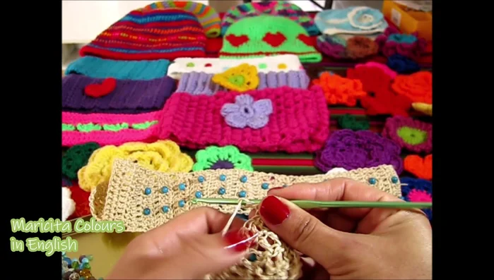 Continue the pattern, alternating bead rows and plain double crochet rows until the desired length is reached.