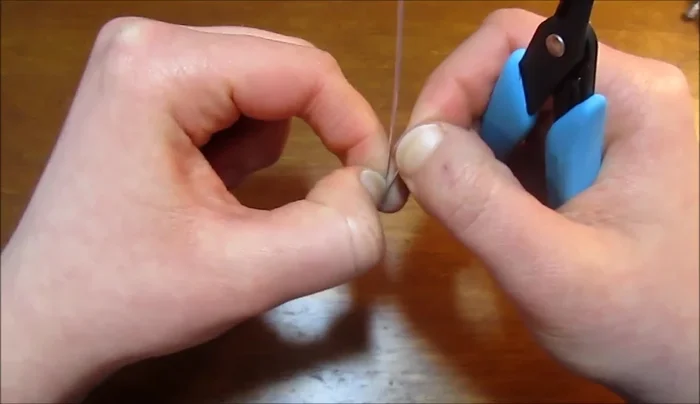 Gently widen the points using round nose pliers to create petal shapes.