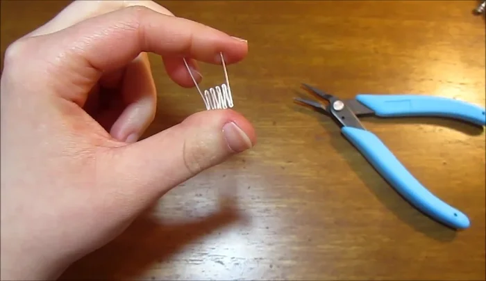 Repeat steps 2-4 with the second wire piece, matching the first one's dimensions for consistency.