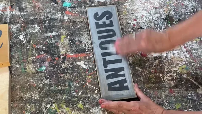 Apply clear wax or a homemade stain to finish the sign (optional).