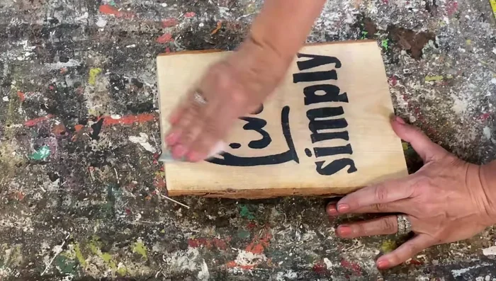 Apply clear wax or a homemade stain to finish the sign (optional).