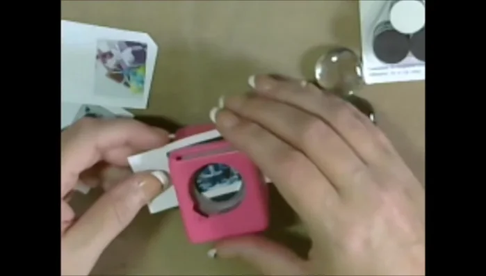 Use a hole punch (upside down) to create perfectly sized circles for the glass drops, inserting the picture to guide the punch.