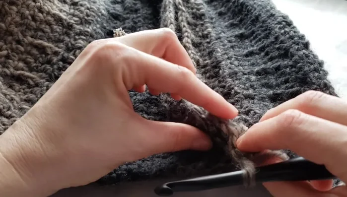 Yarn over and pull through all loops to secure the first stitch.