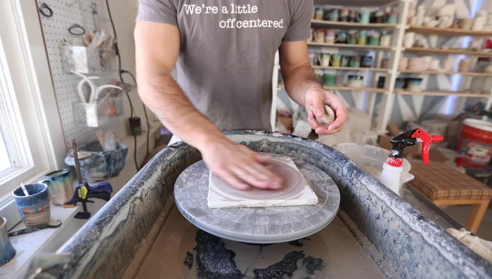 Optional: Add decorative elements such as spirals or other designs to the surface before glazing.