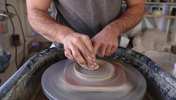 Optional: Add decorative elements such as spirals or other designs to the surface before glazing.