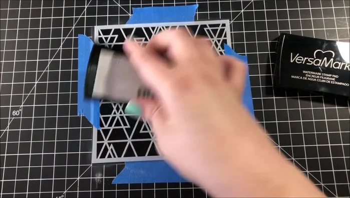 Distress the edges of the background with Mermaid Lagoon Distress Oxide Ink.