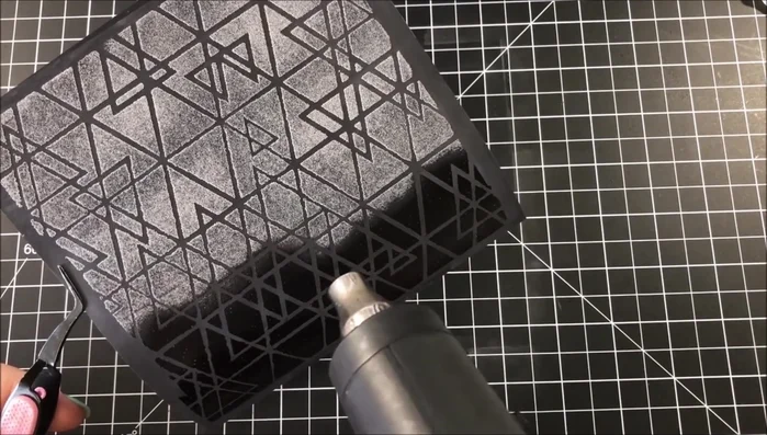 Distress the edges of the background with Mermaid Lagoon Distress Oxide Ink.