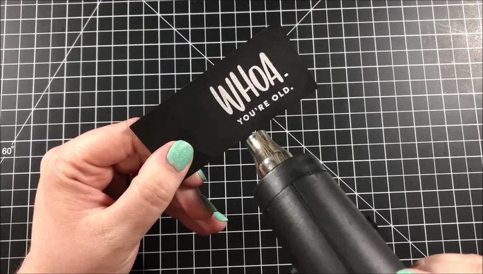 Fussy cut sentiment and adhere it onto vellum.