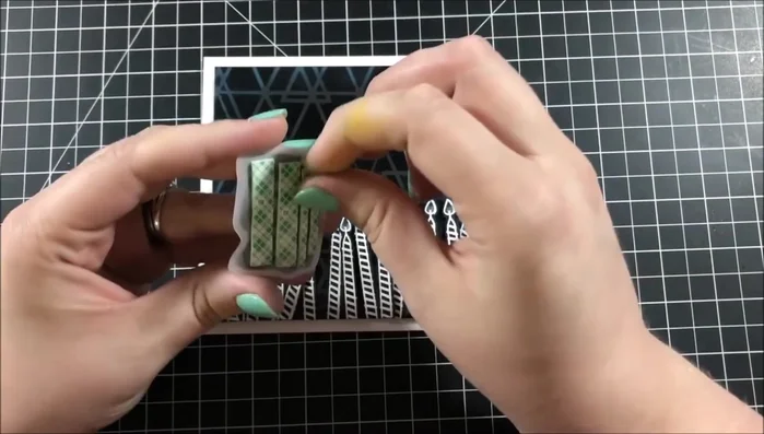 Add glitter to sentiment using glitter brush.