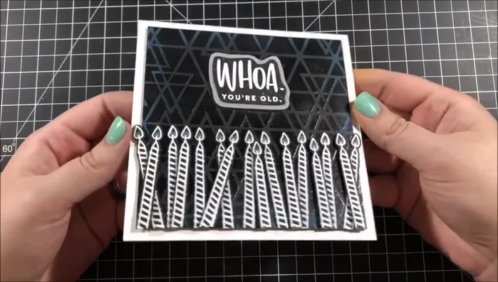 Add glitter to sentiment using glitter brush.