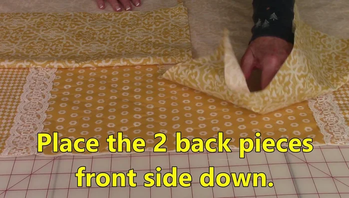 Stitch a 1/2 inch seam around all four sides. Double stitch along the center back seam where the back pieces overlap for added strength.